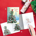 Load image into Gallery viewer, The inside of Tree-Free’s Cardinal Peace card, with the cover and envelope in the background.

