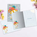 Load image into Gallery viewer, The inside of Tree-Free’s Under the Weather card, with the cover and envelope in the background.
