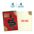 Load image into Gallery viewer, The cover and inside of Tree-Free’s Golden Snake card, along with the following text: “4 greeting cards, 4 matching envelopes”
