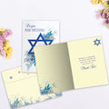 Load image into Gallery viewer, The inside of Tree-Free’s Blue Floral Star card, with the cover and envelope in the background.
