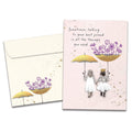 Load image into Gallery viewer, Cover of Wonderful Umbrellas Just Because card (featuring serif text above artwork of two girls holding umbrellas and each other&#39;s hands) and its matching envelope
