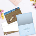 Load image into Gallery viewer, The inside of Tree-Free’s Fantastic Dreams card, with the cover and envelope in the background.
