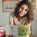Load image into Gallery viewer, Lifestyle image(s) featuring Tree-Free’s Karma Turtle card
