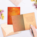Load image into Gallery viewer, The inside of Tree-Free’s May The Sun card, with the cover and envelope in the background.
