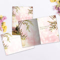 Load image into Gallery viewer, The inside of Tree-Free’s Healing Touch card, with the cover and envelope in the background.
