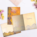 Load image into Gallery viewer, The inside of Tree-Free’s The Day You Were Born card, with the cover and envelope in the background.
