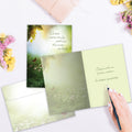 Load image into Gallery viewer, The inside of Tree-Free’s Carried Within Sympathy Card card, with the cover and envelope in the background.
