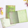 Load image into Gallery viewer, The inside of Tree-Free’s One Size Fits All card, with the cover and envelope in the background.

