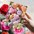 Load image into Gallery viewer, Lifestyle image(s) featuring Tree-Free’s Candy Hearts Valentine card
