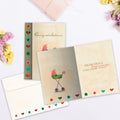Load image into Gallery viewer, The inside of Tree-Free’s Small Beginnings card, with the cover and envelope in the background.

