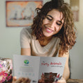 Load image into Gallery viewer, Lifestyle image(s) featuring Tree-Free’s Party Animals card
