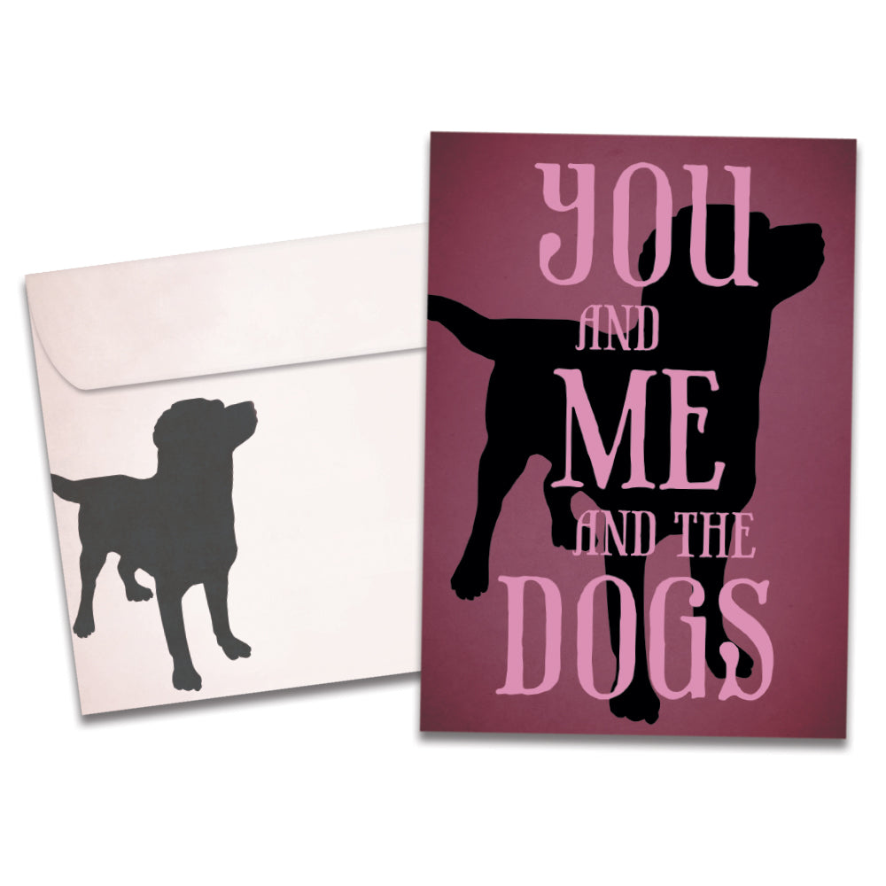 The cover of Tree-Free's You Me Dogs Love Card card, along with its matching envelope.