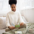 Load image into Gallery viewer, Lifestyle image(s) featuring Tree-Free’s Memories Overflowing Sympathy Card card
