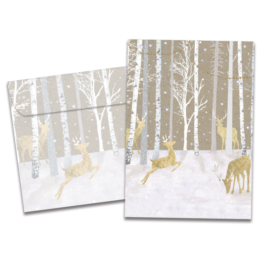 The cover of Tree-Free's Silent Wood Holiday Card card, along with its matching envelope.