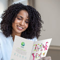 Load image into Gallery viewer, Lifestyle image(s) featuring Tree-Free&#39;s Flowery Thank You Card card

