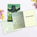 Load image into Gallery viewer, The inside of Tree-Free’s Makes You Stronger card, with the cover and envelope in the background.
