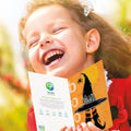 Load image into Gallery viewer, Lifestyle image(s) featuring Tree-Free&#39;s Witch Way Halloween Card card
