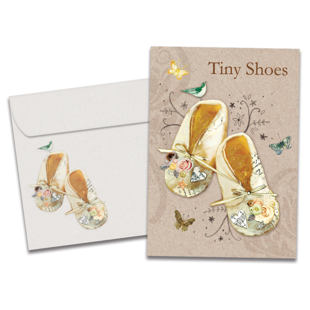 The cover of Tree-Free's Baby Booties card, along with its matching envelope.
