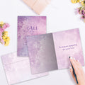 Load image into Gallery viewer, The inside of Tree-Free’s All That We Love card, with the cover and envelope in the background.

