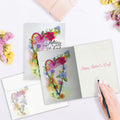 Load image into Gallery viewer, The inside of Tree-Free’s Mother Heart card, with the cover and envelope in the background.
