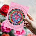 Load image into Gallery viewer, Lifestyle image(s) featuring Tree-Free’s Window To The Heart Mandala Love Card card
