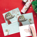 Load image into Gallery viewer, The inside of Tree-Free’s Peace Love Joy card, with the cover and envelope in the background.
