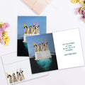 Load image into Gallery viewer, The inside of Tree-Free’s Penguin Cake card, with the cover and envelope in the background.
