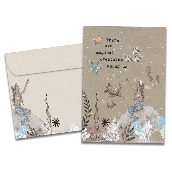 The cover of Tree-Free's Magical Creatures card, along with its matching envelope.