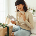 Load image into Gallery viewer, Lifestyle image(s) featuring Tree-Free’s Sweet Polar Christmas Christmas Card card
