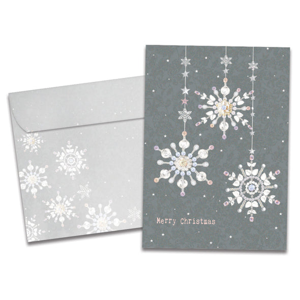 The cover of Tree-Free's Silver And Gold Christmas Christmas Card card, along with its matching envelope.