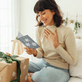 Load image into Gallery viewer, Lifestyle image(s) featuring Tree-Free’s Silver And Gold Christmas Christmas Card card
