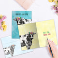 Load image into Gallery viewer, The inside of Tree-Free’s Udderly Grateful card, with the cover and envelope in the background.
