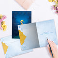Load image into Gallery viewer, The inside of Tree-Free’s Rare Jewel Encouragement Card card, with the cover and envelope in the background.
