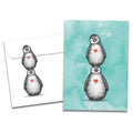 Load image into Gallery viewer, The cover of Tree-Free&#39;s Penguin Pile Thinking Of You Card card, along with its matching envelope.
