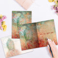 Load image into Gallery viewer, The inside of Tree-Free’s Buddha Breath card, with the cover and envelope in the background.
