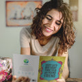 Load image into Gallery viewer, Lifestyle image(s) featuring Tree-Free’s Wink Emoji Birthday card

