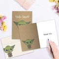 Load image into Gallery viewer, The inside of Tree-Free’s Yoda Best card, with the cover and envelope in the background.

