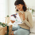 Load image into Gallery viewer, Lifestyle image(s) featuring Tree-Free’s Cat Bird Christmas Christmas Card card
