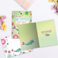 Load image into Gallery viewer, The inside of Tree-Free’s True To Yourself Narwhal card, with the cover and envelope in the background.
