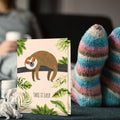 Load image into Gallery viewer, Lifestyle image(s) featuring Tree-Free’s Sloth Slow Lane card
