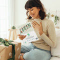 Load image into Gallery viewer, Lifestyle image(s) featuring Tree-Free’s Merry Little Christmas Drawn Christmas Card card

