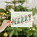 Load image into Gallery viewer, Lifestyle image(s) featuring Tree-Free&#39;s Merry Little Christmas Drawn Christmas Card card
