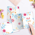 Load image into Gallery viewer, The inside of Tree-Free’s Best Thank You Card card, with the cover and envelope in the background.
