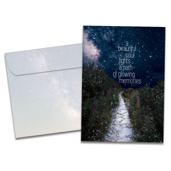 The cover of Tree-Free's Glowing Path Sympathy Card card, along with its matching envelope.