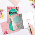 Load image into Gallery viewer, The inside of Tree-Free’s Inside And Out Beauty Thinking Of You Card card, with the cover and envelope in the background.
