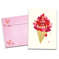 Load image into Gallery viewer, The cover of Tree-Free&#39;s Melt My Heart Valentine card, along with its matching envelope.
