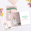 Load image into Gallery viewer, The inside of Tree-Free’s Magical Cat Unicorn card, with the cover and envelope in the background.

