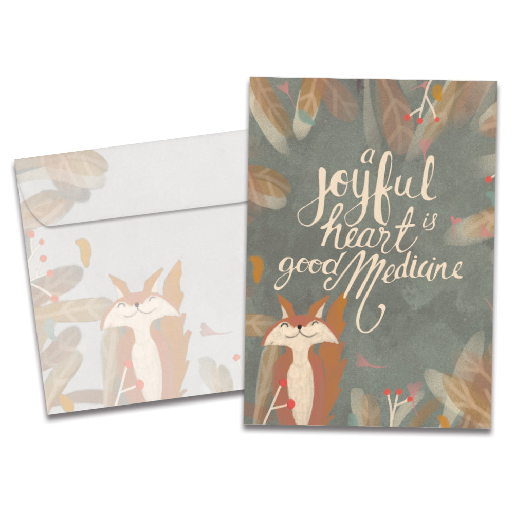 The cover of Tree-Free's A Joyful Heart card, along with its matching envelope.