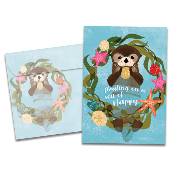 The cover of Tree-Free's Sea Of Happy card, along with its matching envelope.