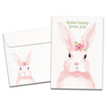 Load image into Gallery viewer, The cover of Tree-Free&#39;s Pink Bunny card, along with its matching envelope.
